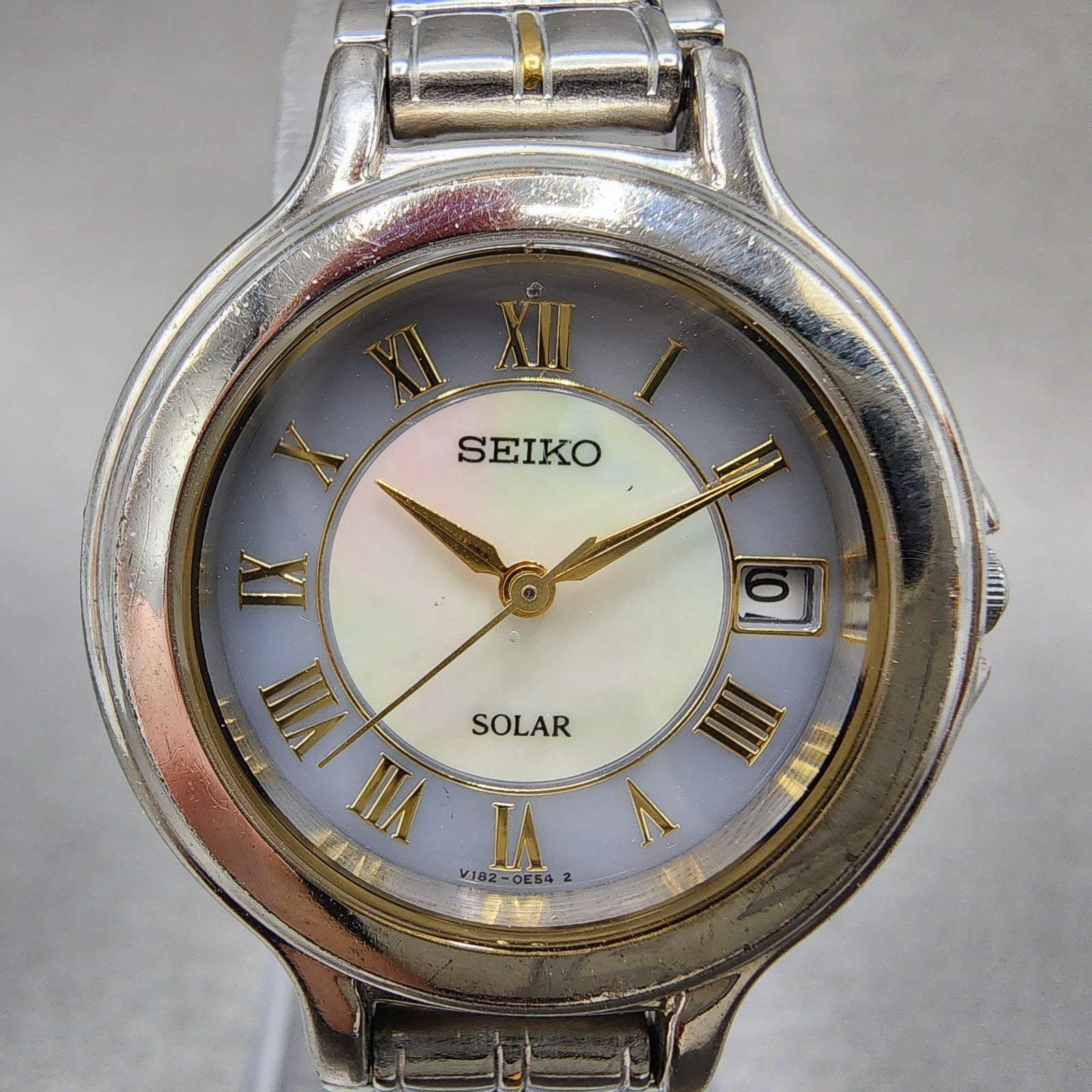 Seiko Solar Watch Women 28mm MOP Dial Two Tone Date Round V1820C70 Runs B12341