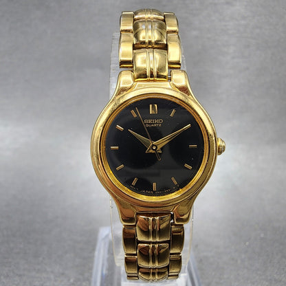 Seiko Watch Women 21mm Black Dial Gold Tone Round V4011111 New Battery0