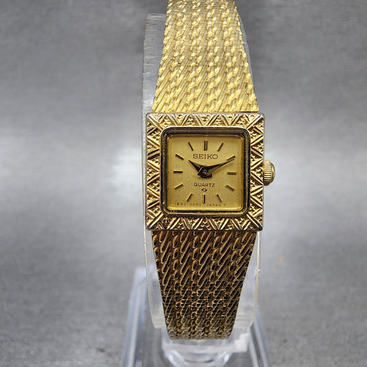 Seiko Tank Watch Women 13mm Champagne Dial Gold Tone 1e205040 New Battery0