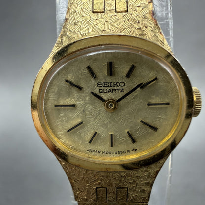 Seiko Watch Women 17mm Gold Dial Gold Tone Oval 1400-7389 New Battery Vintage AB1