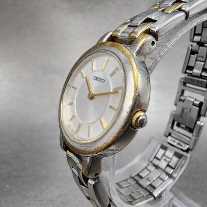 Seiko Watch Women 24mm White Dial Two Tone Round 1N00-1E19 New Battery A123