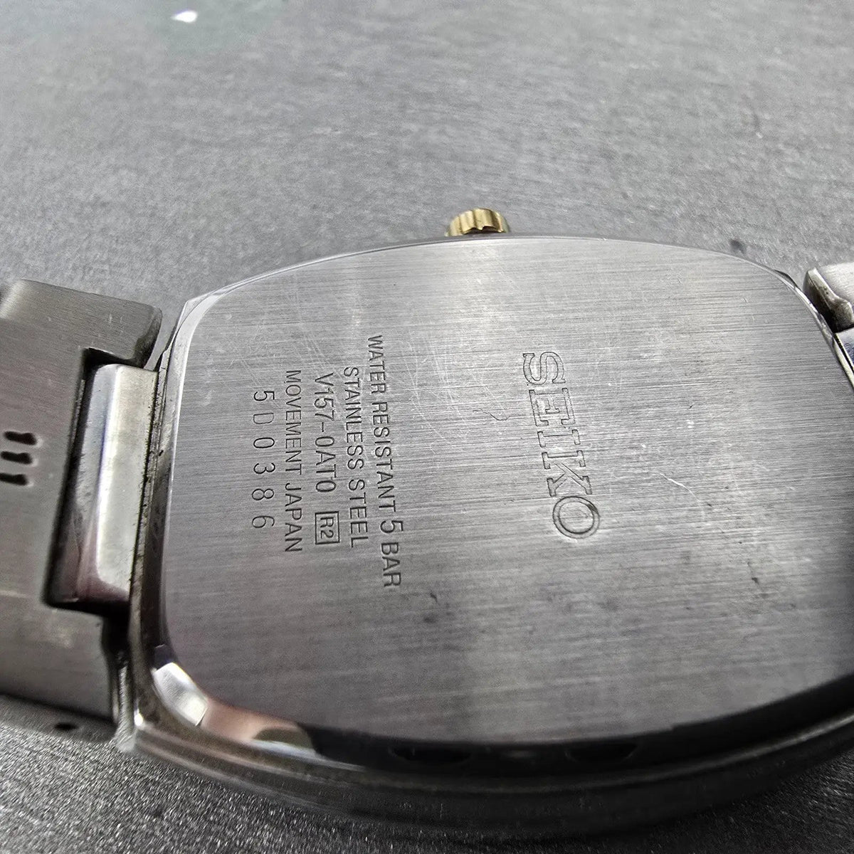Seiko Solar Tank Watch Men 35mm Gray Dial Two Tone Date Rectangle V157-0AT0 Runs9