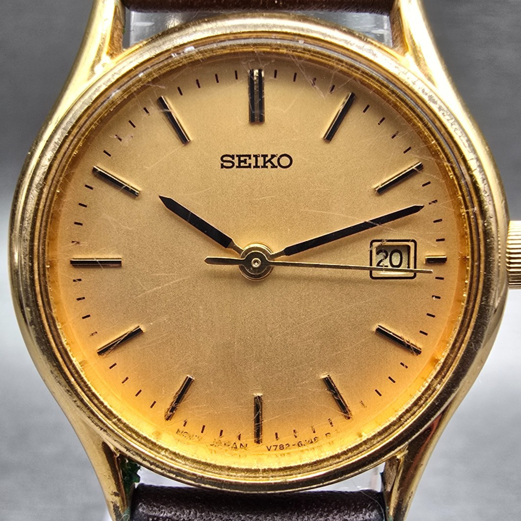 Seiko Watch Women 25mm Gold Dial Gold Tone Date Round V782-6E50 New Battery JP1