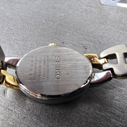Seiko Solar Watch Women 19mm Silver Dial Two Tone Oval V115-0BY0 Runs9
