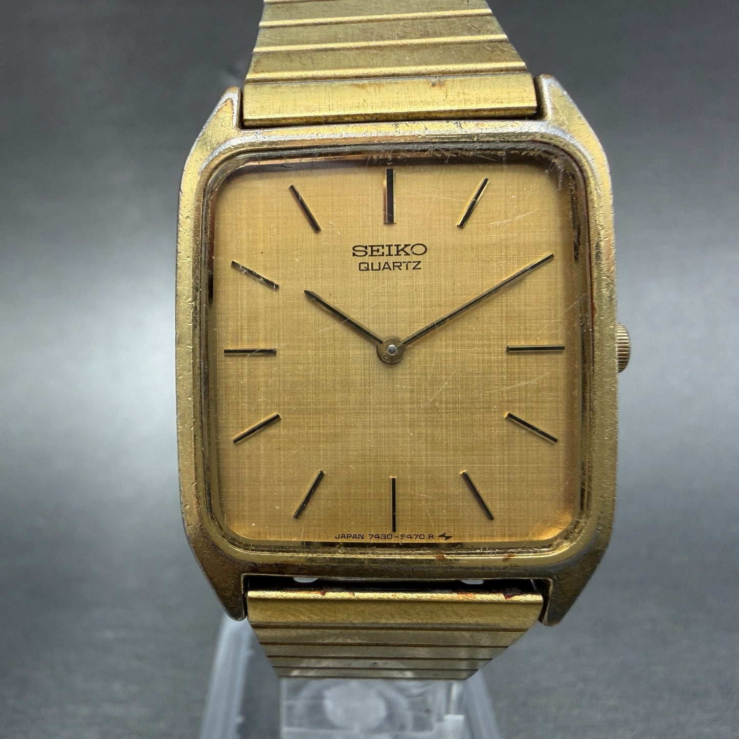 Seiko tank Watch Men 26mm Champagne Dial Gold Tone Rectangle 7430-5309 New Batt0