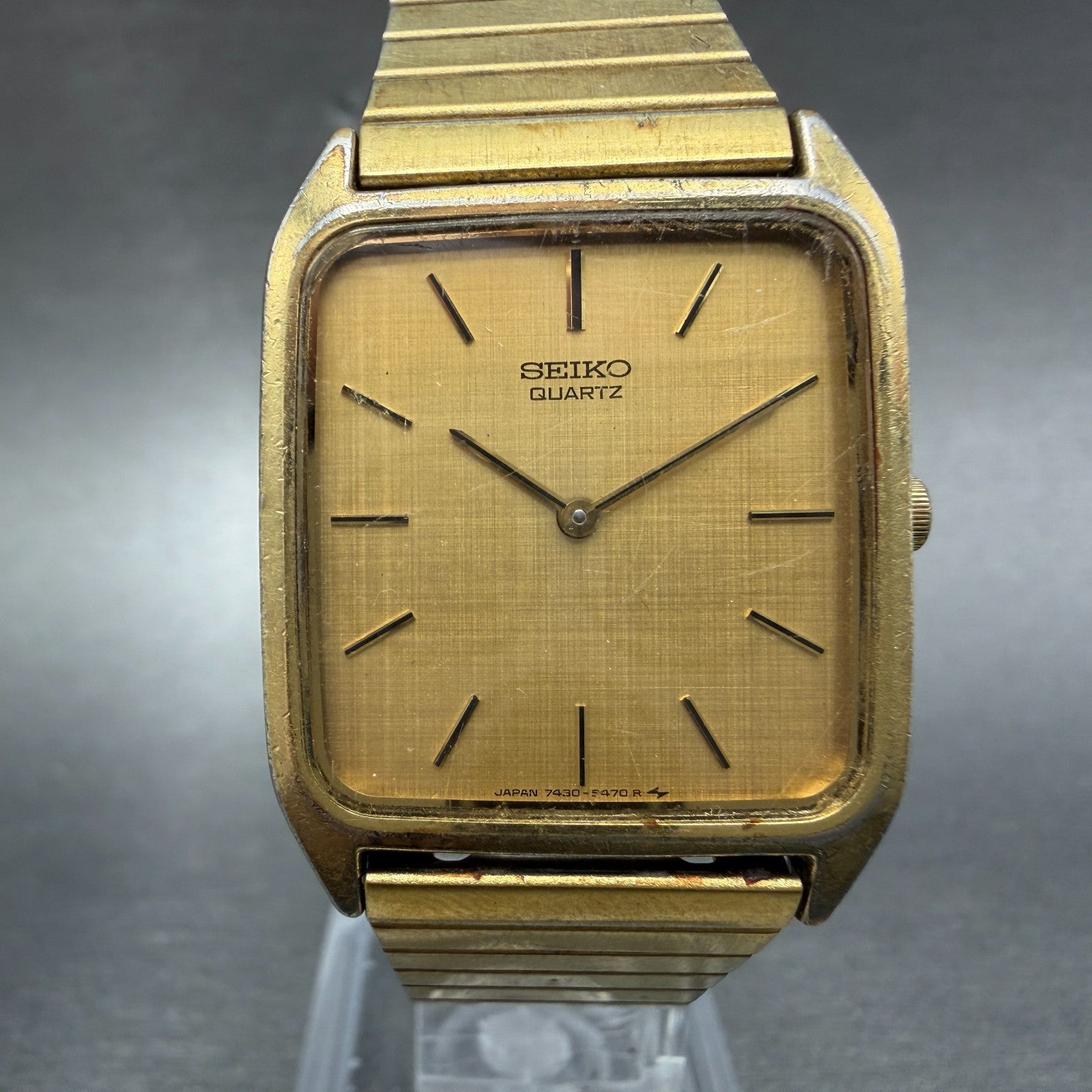 Seiko tank Watch Men 26mm Champagne Dial Gold Tone Rectangle 7430-5309 New Batt0