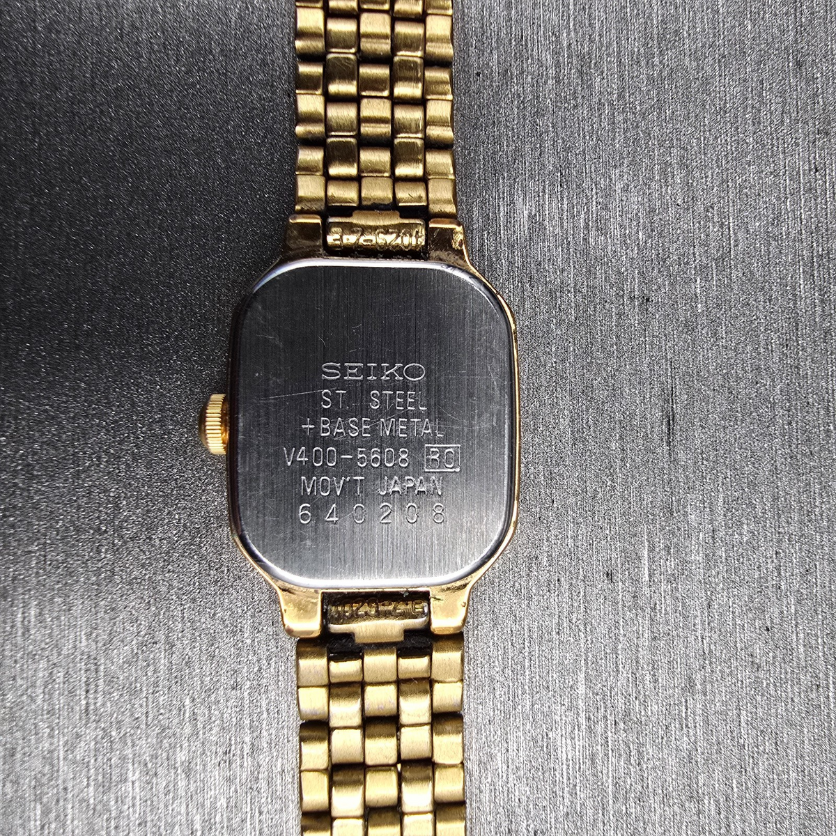 Seiko Watch Women 17mm Ivory Dial Gold Tone Rectangle V400-5608 New Battery JP4310