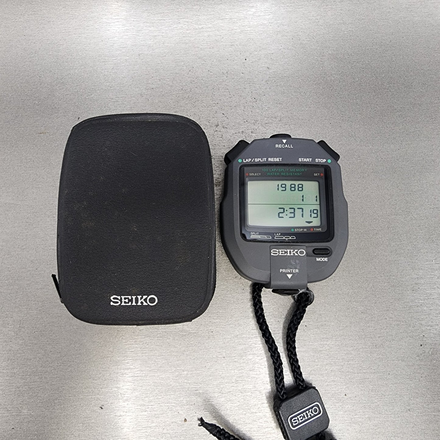 Seiko SVAY006 Stopwatch Digital Gray Tone S1234000 New Battery W/Case0