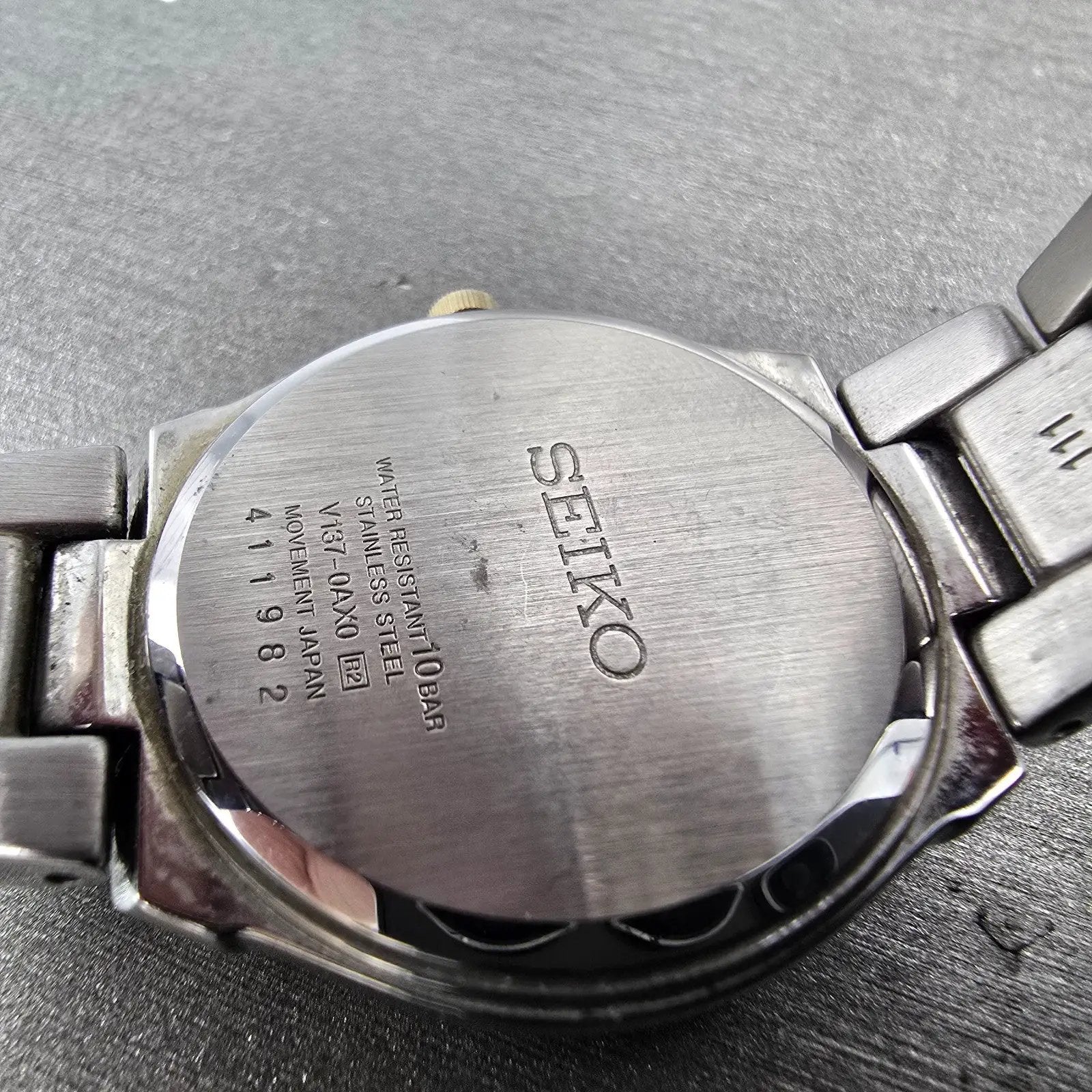 Seiko Solar Watch Women 30mm White Dial Two Tone Date Round V137-0AX0 Runs9