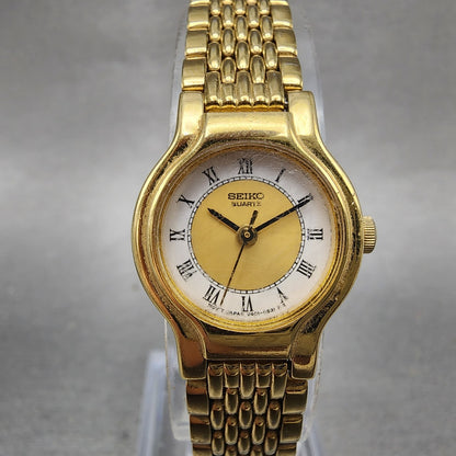 Seiko Watch Women 19mm White Dial Gold Tone Round V4010289 New Battery0