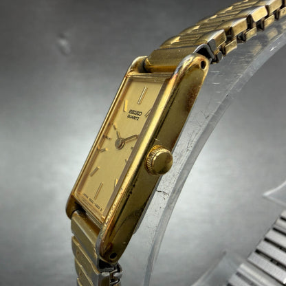 Seiko Tank Watch Women 12mm Champagne Dial Gold Tone 2E20-5239 New Battery H7642