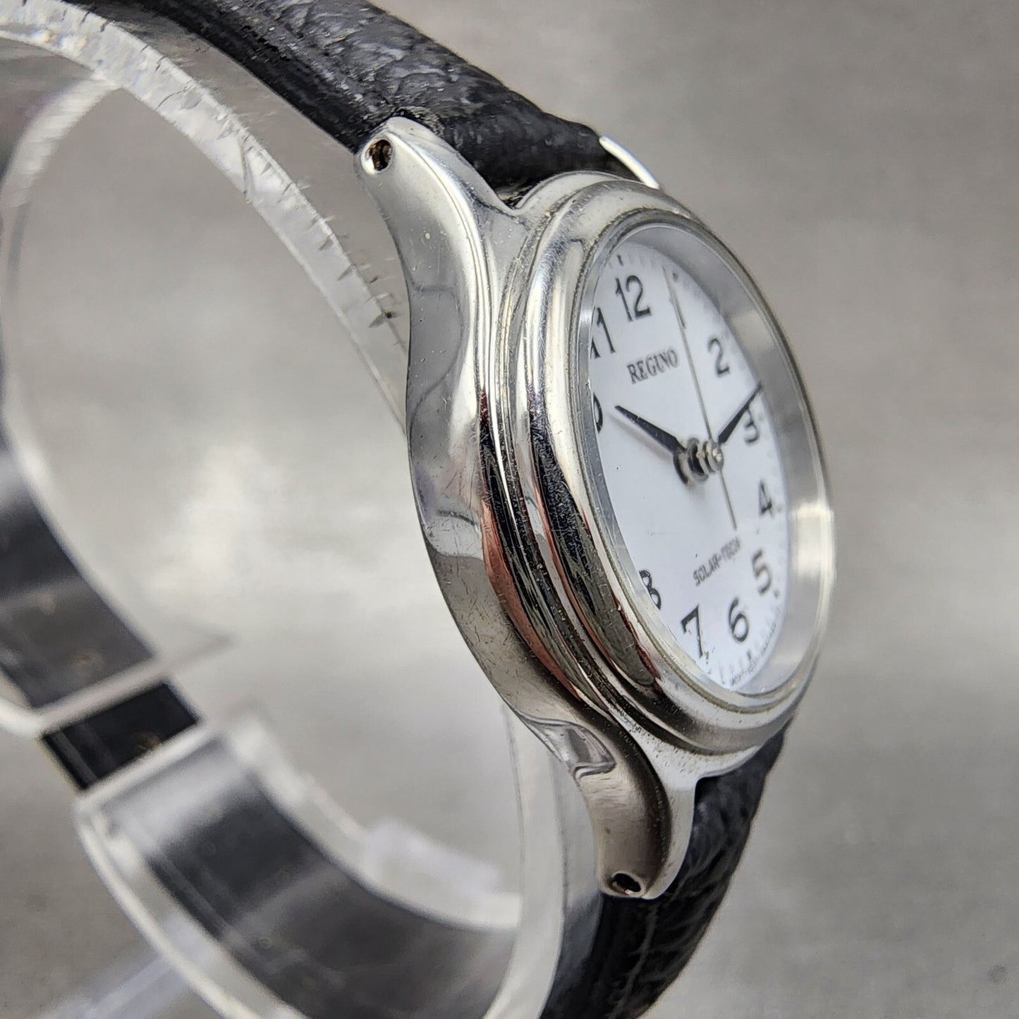 Citizen Reguno Watch Women 24mm White Dial Silver Tone Solar Round Runs E031T013