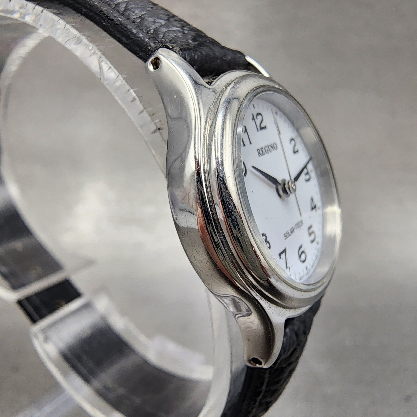 Citizen Reguno Watch Women 24mm White Dial Silver Tone Solar Round Runs E031T013