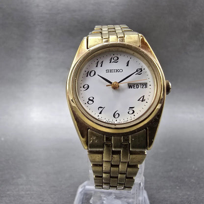 Seiko Watch Women 23mm White Dial Gold Tone Daydate Round 7N83-0011 New Batteryk5