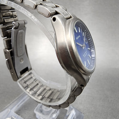 Reguno Solar Watch Women 25mm Blue Dial Titanium Date E011-S028132 Runs