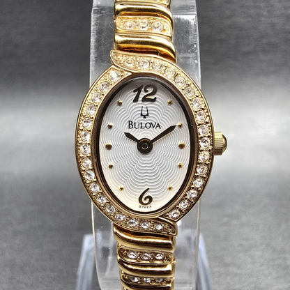 Bulova Watch Women 17mm White Dial Gold Tone Oval Gemmed 97V23 New Battery0