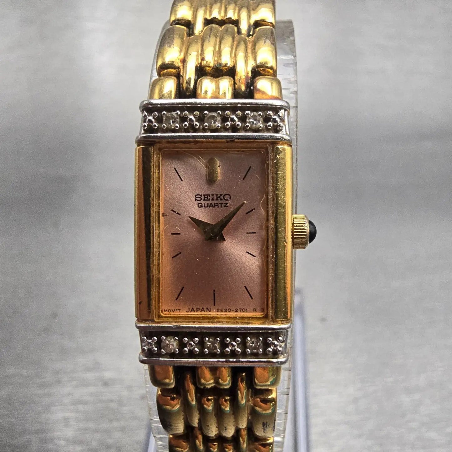 Seiko Watch Women 13mm Pink Dial Gold Tone Diamonds Rectangle 2E20-7191 New Batt0