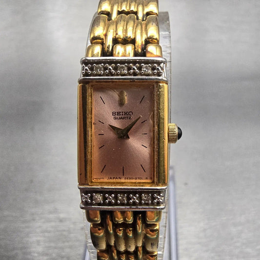 Seiko Watch Women 13mm Pink Dial Gold Tone Diamonds Rectangle 2E20-7191 New Batt0