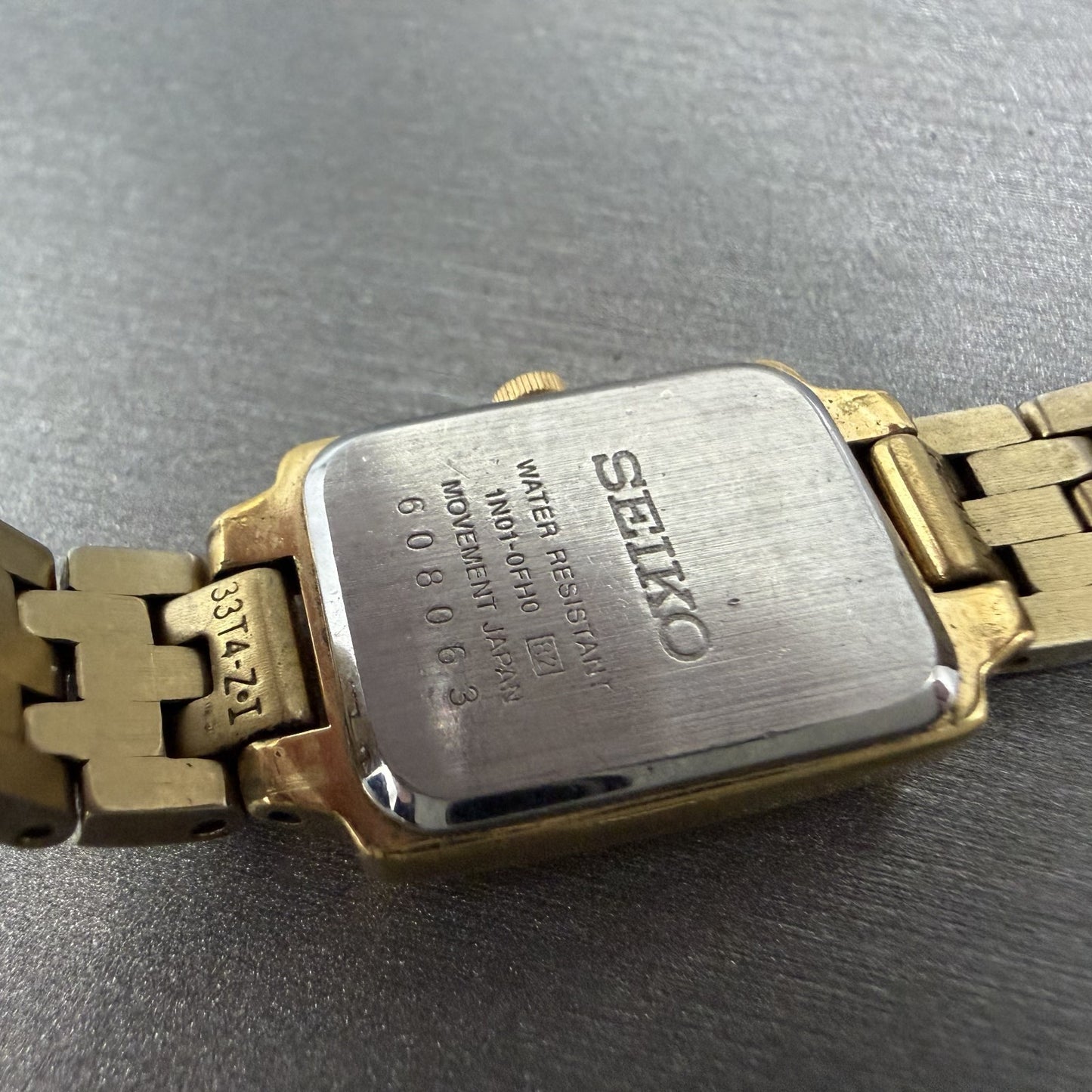 Seiko Tank Watch Women 16mm Champagne Dial Gold Tone 1N01-0FH0 New Battery ZYX29
