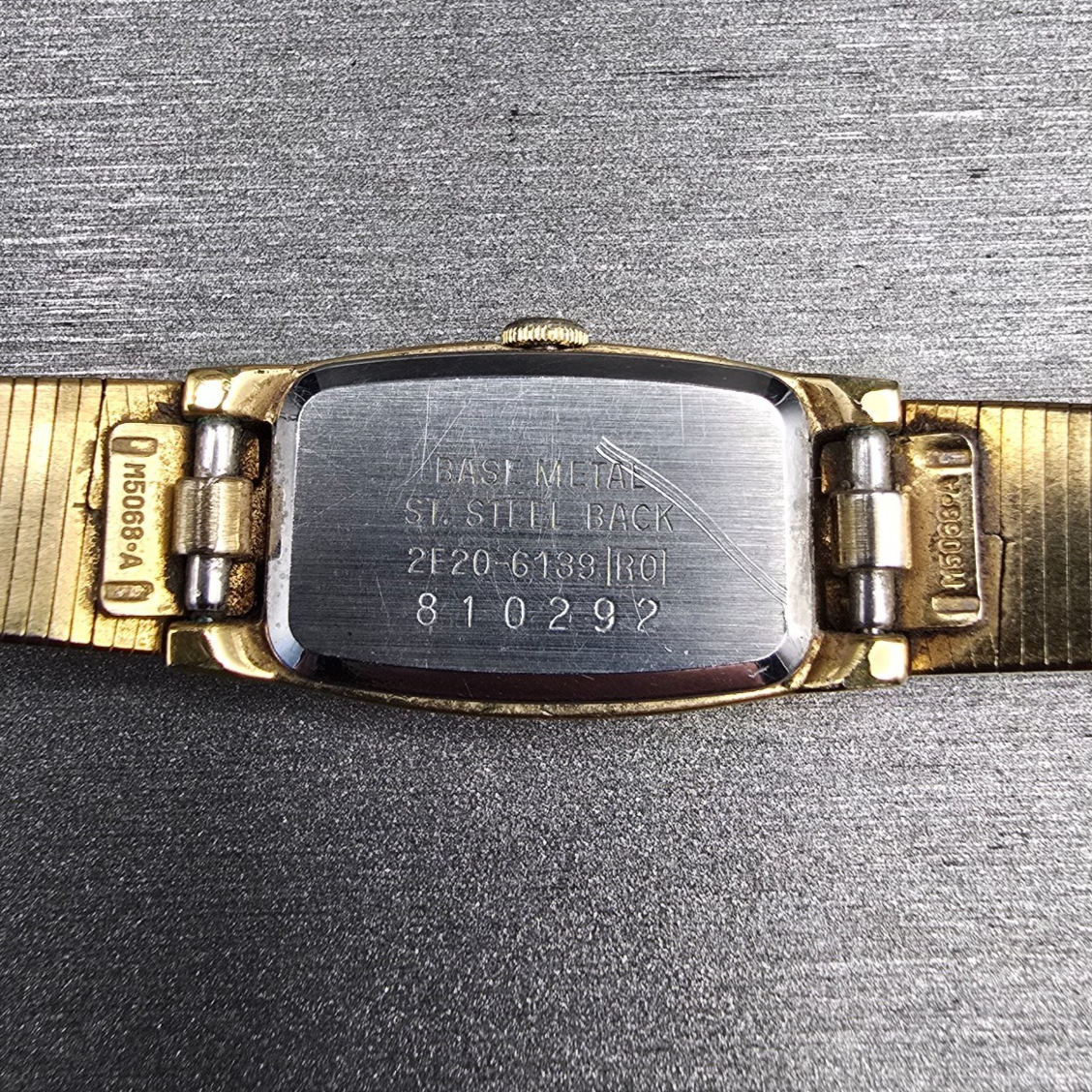Seiko Watch Women 13mm Ivory Dial Gold Tone Rectangle 2E20-6139 New Battery10
