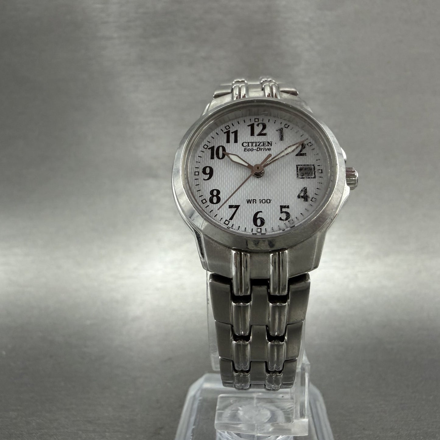 Citizen EcoDrive Watch Women 25mm White Dial Silver Tone Date E011S06489 Runs5