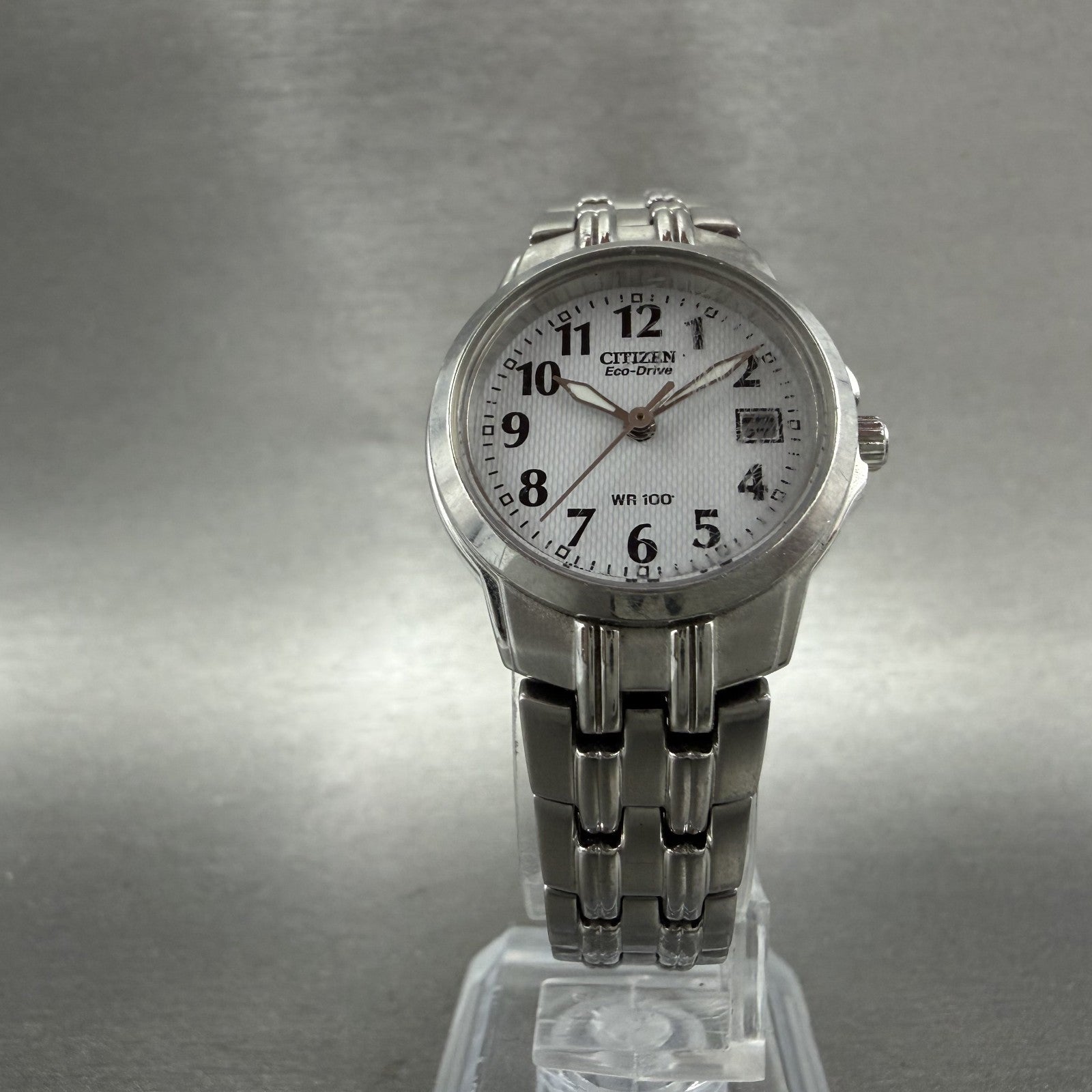 Citizen EcoDrive Watch Women 25mm White Dial Silver Tone Date E011S06489 Runs5