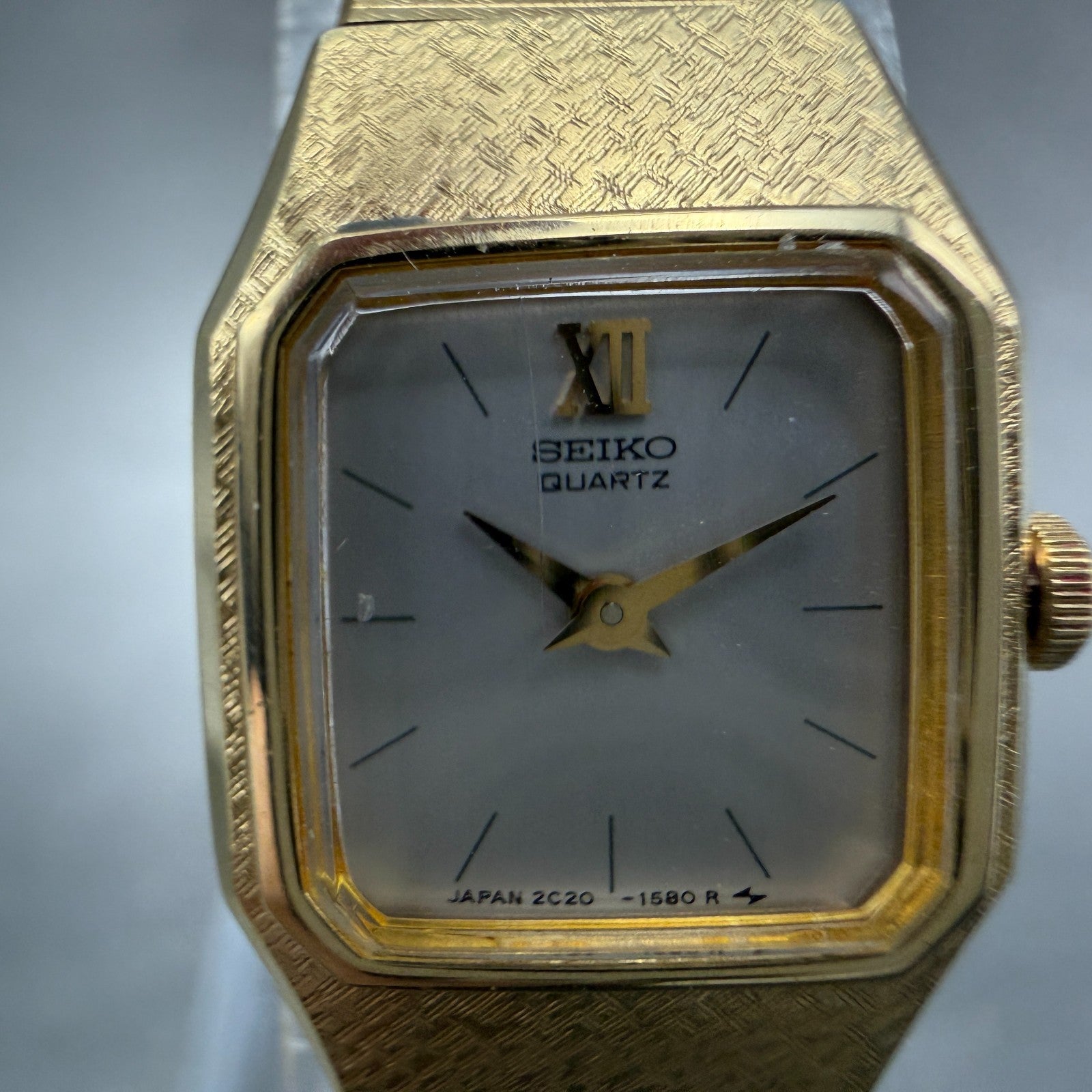 Seiko Watch Women 17mm Silver Dial Gold Tone Rectangle 2C20-5780 New Battery1