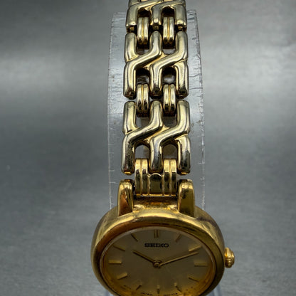 Seiko Watch Women 21mm Champagne Dial Gold Tone Round 1N00-1E09 New Battery BD74