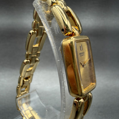 Seiko Tank Watch Women 13mm Champagne Dial Gold Tone Rectangle 2E207108 New Bat3