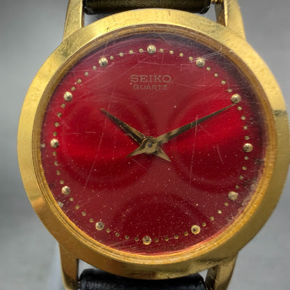 Seiko Watch Women 26mm Red Dial Gold Tone Round 1N00-0A29 New Battery Leather 561