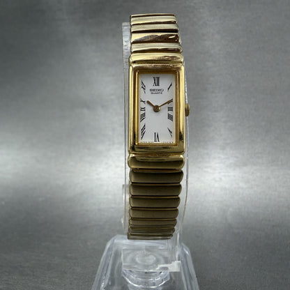 Seiko Tank Watch Women 13mm White Dial Gold Tone Rectangle 2E20-6759 New Batt YZ5