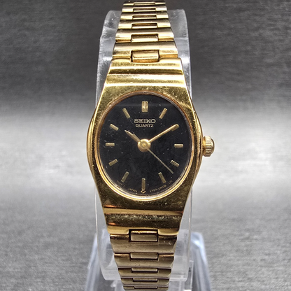 Seiko Watch Women 17mm Black Dial Gold Tone Oval 2Y01-5C89 New Battery Vintage0