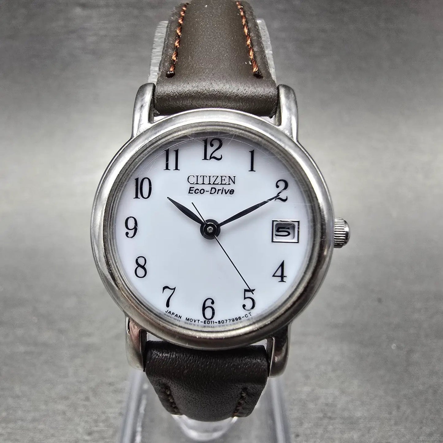Citizen Eco-Drive Watch Women 23mm White Dial Silver Tone Date E011-S049415 Runs0