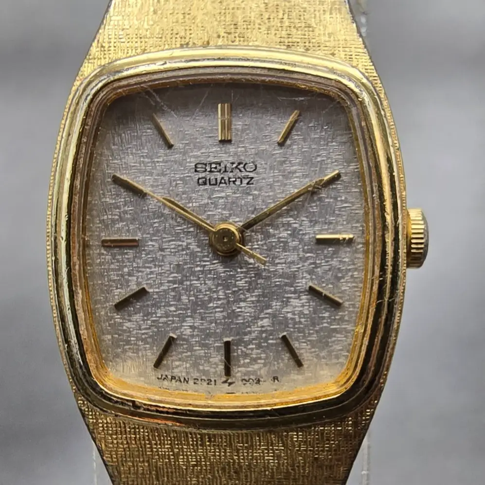 Seiko Watch Women 17mm Silver Dial Gold Tone Rectangle 2P21-5010 New Battery VTG1