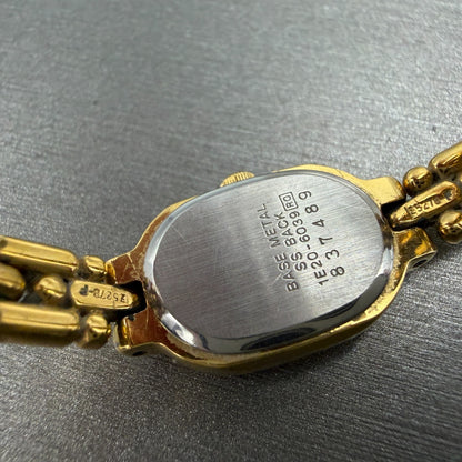 Seiko Watch Women 13mm Champagne Dial Gold Tone Oval 1e20-6039 New Battery VTG9