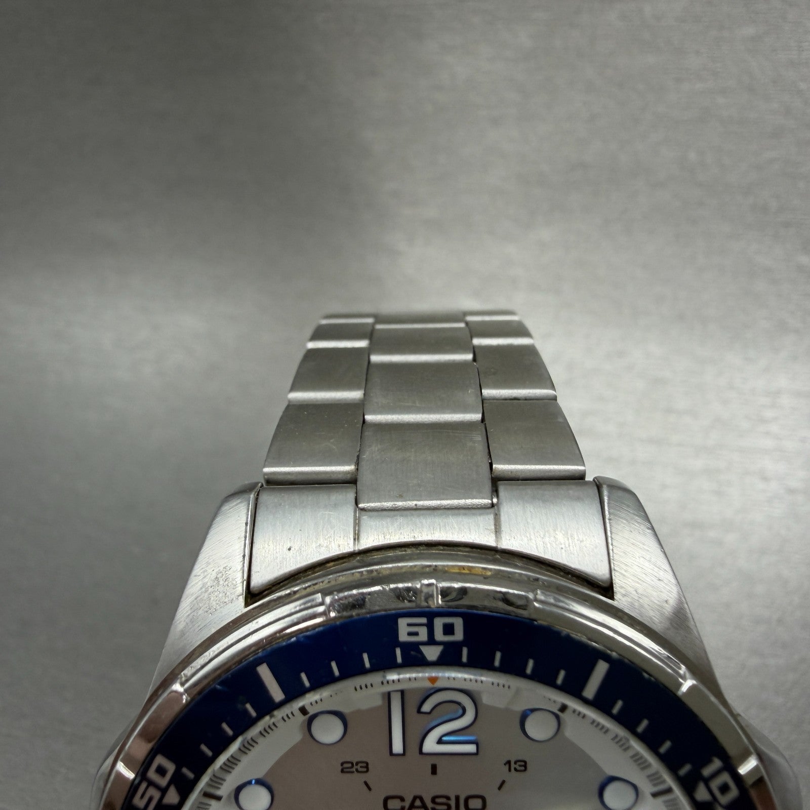 Casio Watch Men 44mm Silver Dial Silver Tone Daydate MTD-100 New Batt Blue Bezel4