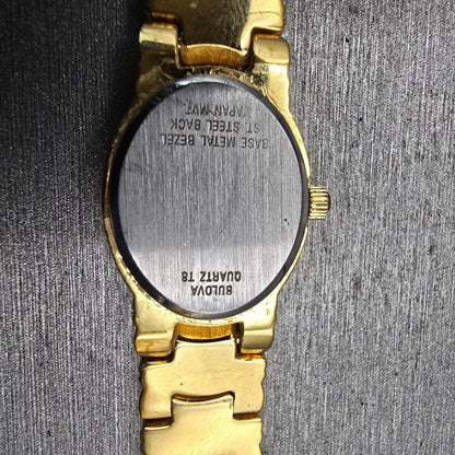 Bulova Watch Women 16mm Ivory Dial Gold Tone Gemmed Oval 98R37 New Battery10