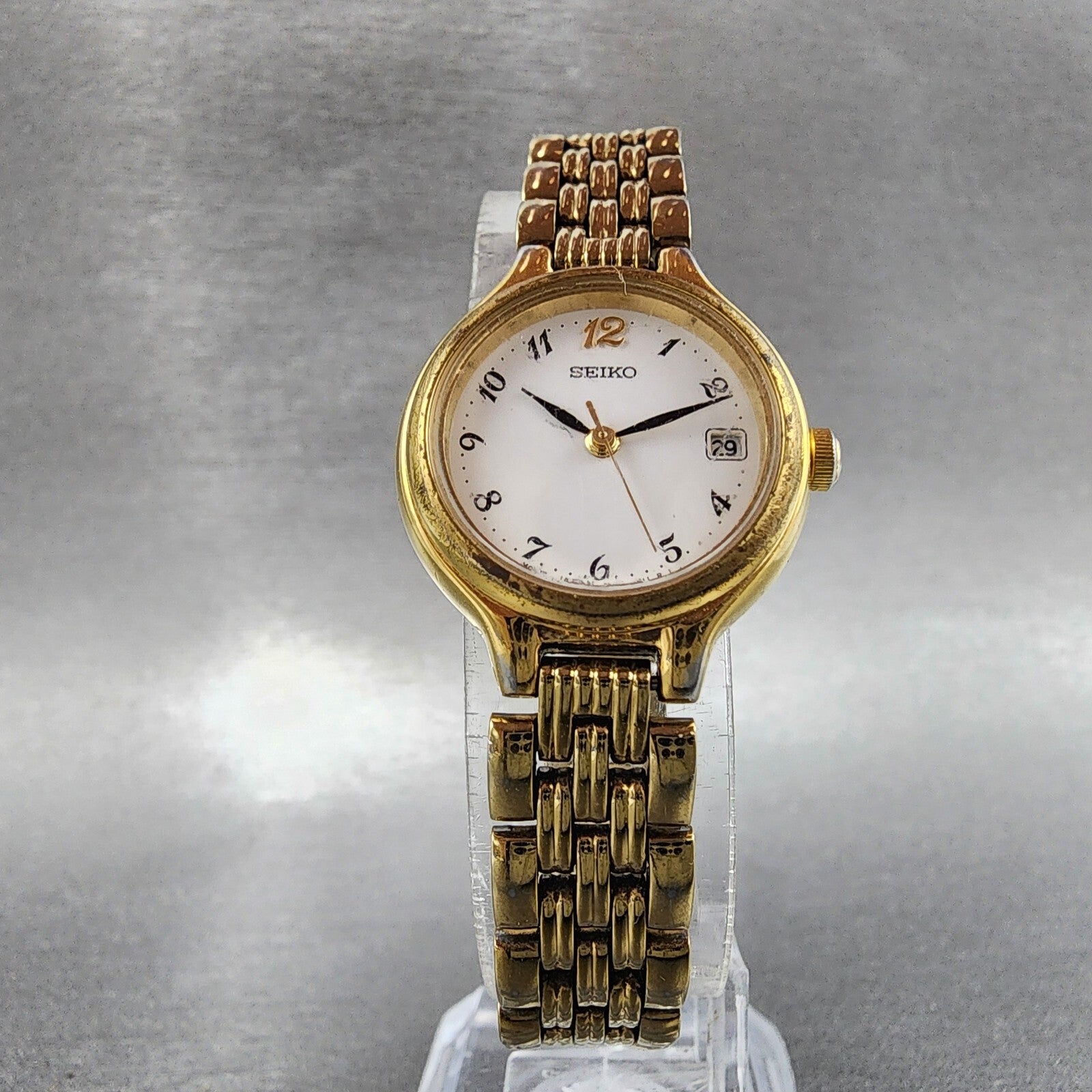 Seiko Watch Women 23mm White Dial Gold Tone Date Round 7N820228 New Battery B125