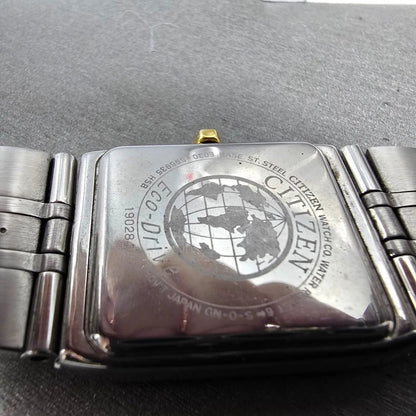 Citizen Eco-Drive Tank Watch Men 28mm White Dial Two Tone Rectangle E030 Works9