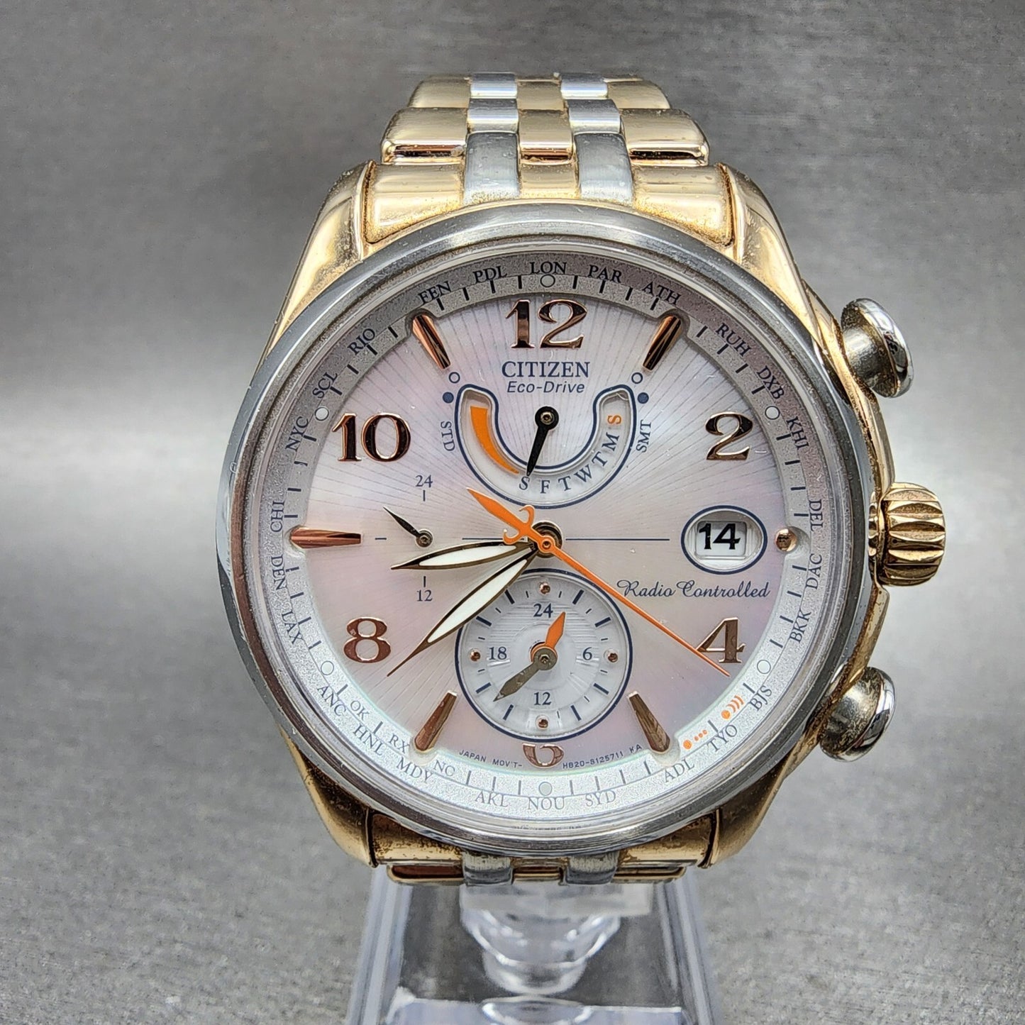 Citizen EcoDrive World Time Watch Women 41mm MOP Dial Two Tone Date Works0