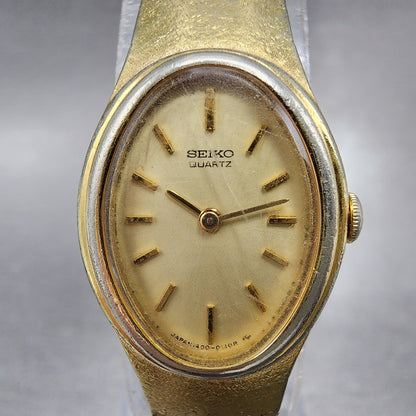 Seiko Watch Women 17mm Champagne Dial Gold Tone Oval 14005089 New Battery1