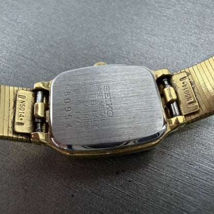 Seiko Tank Watch Women 17mm Black Dial Gold Tone Rectangle 2P20-5D30 New Battery9