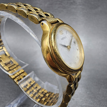 Seiko Watch Women 23mm White Dial Gold Tone Date Round 7N820228 New Battery4
