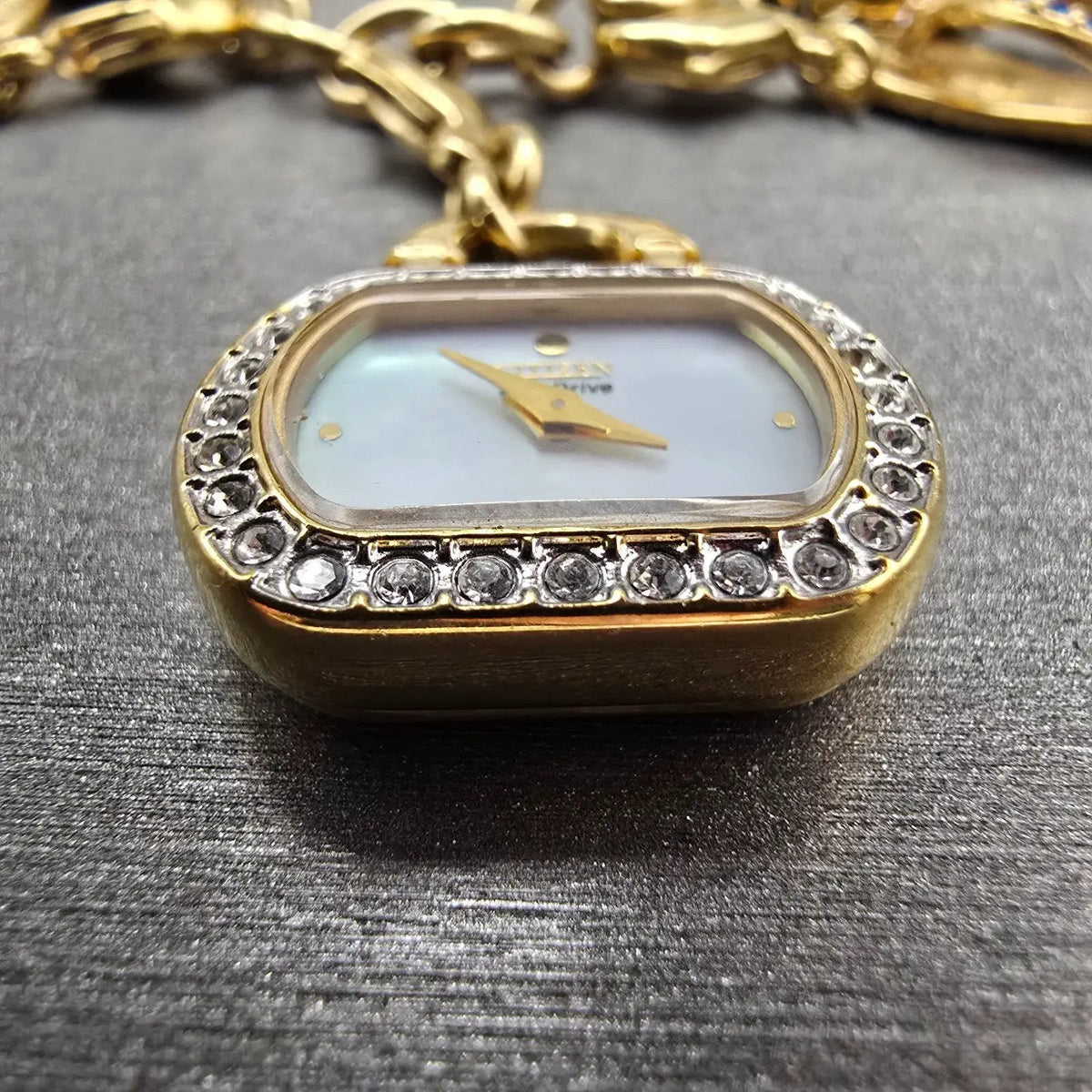 Citizen Eco-Drive Charm Bracelet Watch Women 20mm MOP Dial G620-S031117 Works3