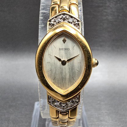 Seiko Watch Women 17mm MOP Dial Gold Diamond Bezel Oval 1N00-6E79 New Battery JP0