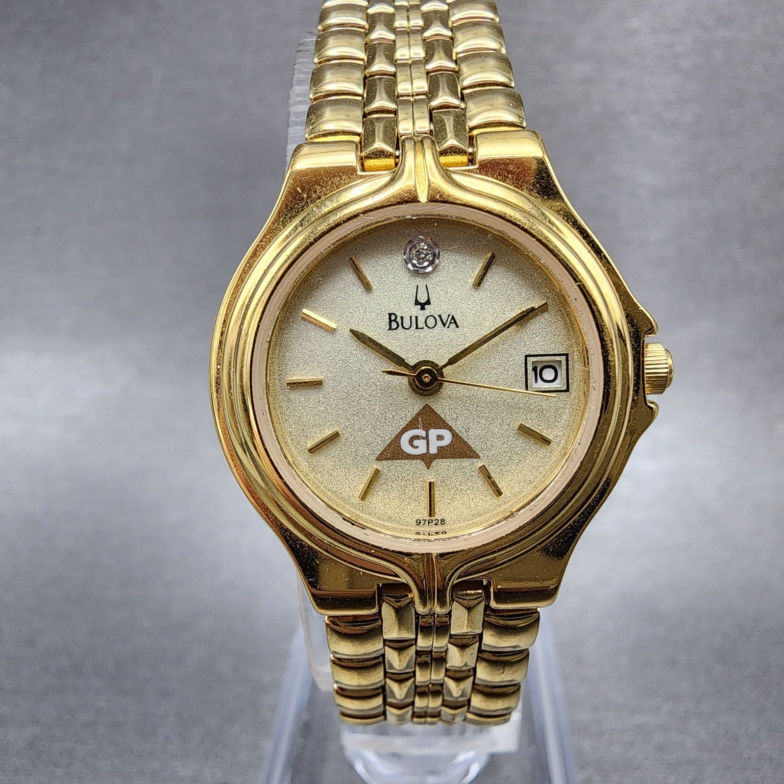 Bulova Watch Women 24mm Champagne Dial Gold Tone Date 97P28 New Battery Diamond0