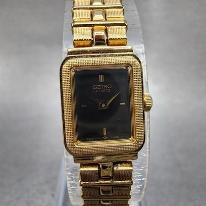 Seiko Tank Watch Women 13mm Gold Tone Rectangle 1e205689 New Battery0