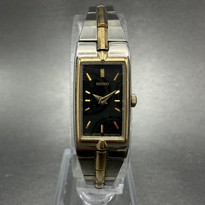 Seiko Tank Watch Women 13mm Black Dial Two Tone Rectangle 2E20-0AY0 New Batt II60
