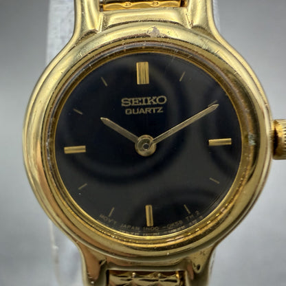 Seiko Watch Women 19mm Black Dial Gold Tone Round Vintage 1N00-0C49 New Battery1