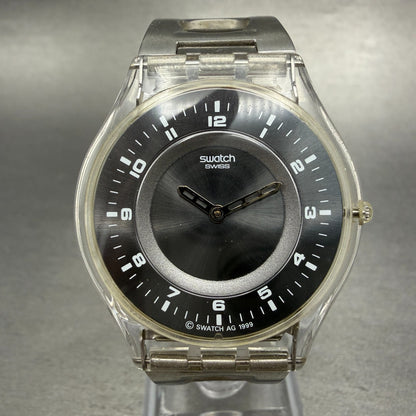Swatch Skin Simple Like Watch Unisex 34mm Gray Dial Clear Case Round New Battery0